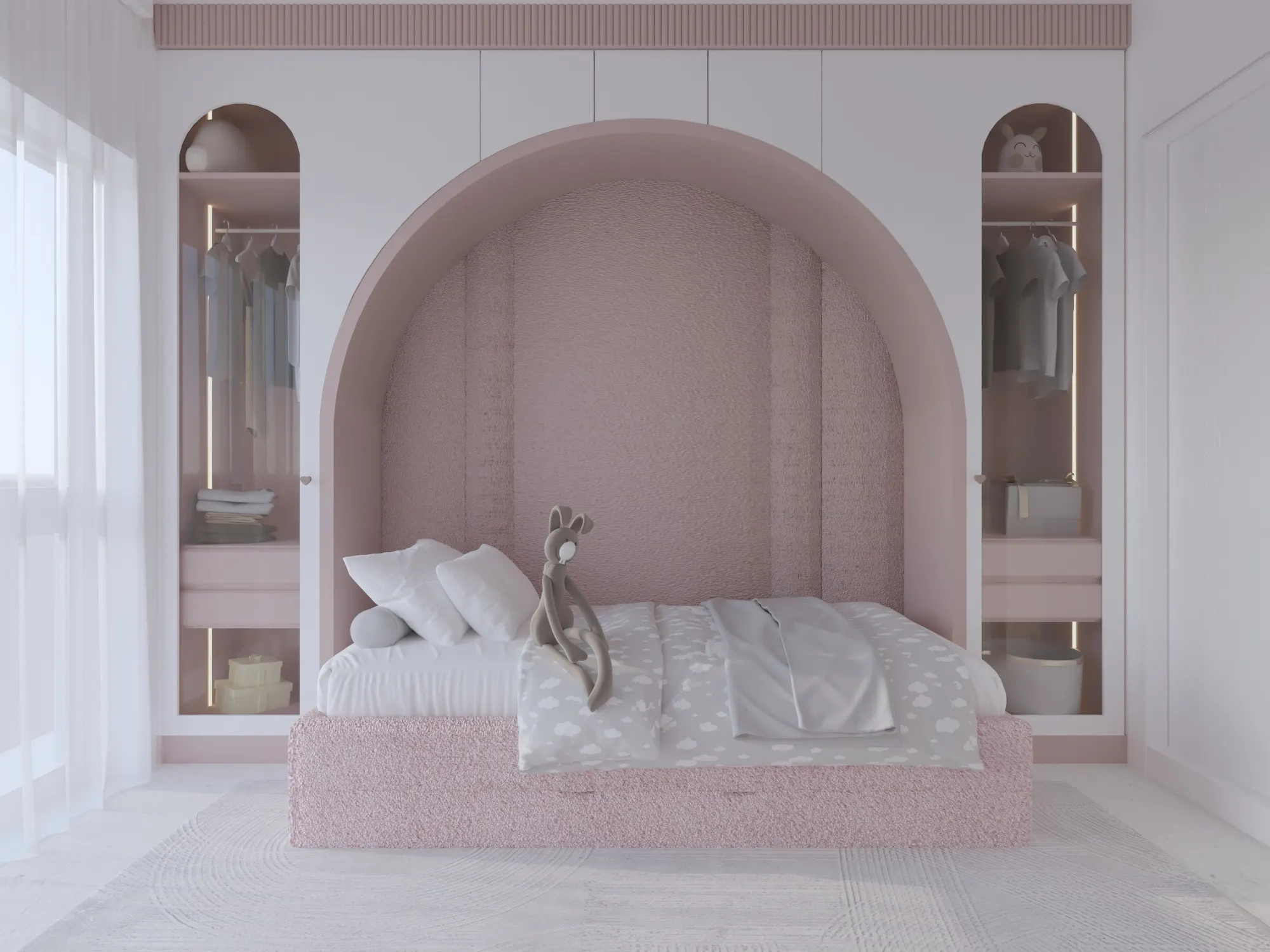 Children's bedroom with a dusty pink arched alcove above the bed and matching glass-front wardrobes on both sides